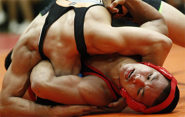 Iolani's KJ Pascua beat Pac-5's Cole Chandler at Mid-Pacific Institute on Friday. Jamm Aquino / Star-Advertiser