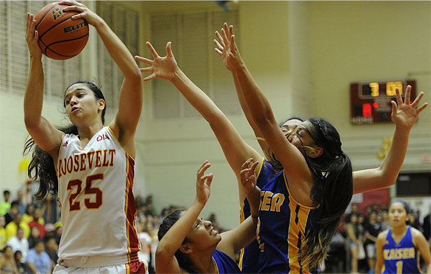 Roosevelt’s Keala Quinlan pulls down a rebound over Kaiser on Thursday. Bruce Asato / Star-Advertiser