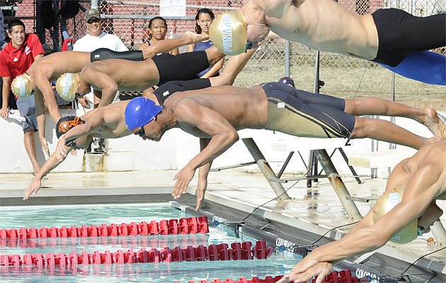 Kamehameha's Kanoa Kaleoaloha, in the blue cap, broke two meet records at Kalani on Saturday. Photo by Bruce Asato / Honolulu Star-Advertiser