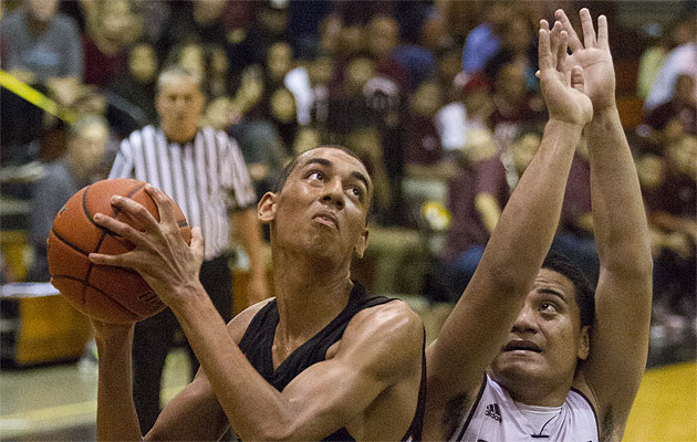 Campbell's David Marrero focused on the basket as Farrington's Tuamasaga Unutoa tried to defend on Thursday. Cindy Ellen Russell / Star-Advertiser