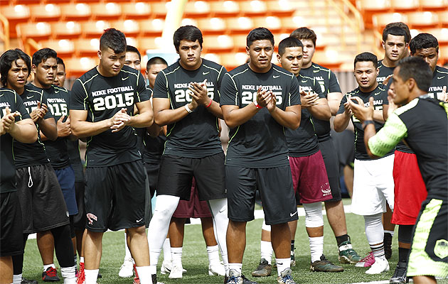 High school football players go through drills during the 2015 Nike football combine on Sunday, February 8, 2015 at Aloha Stadium in Halawa.  (Jamm Aquino/Honolulu Star-Advertiser).
