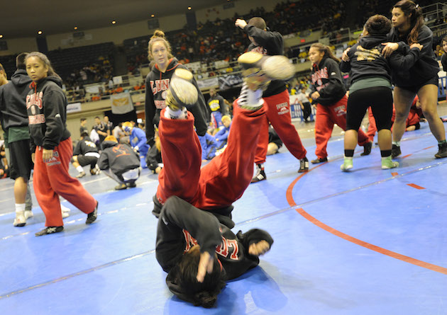 Lahainaluna's girls wrestling teams gets ready for the finals. Photo by Bruce Asato/Star-Advertiser.