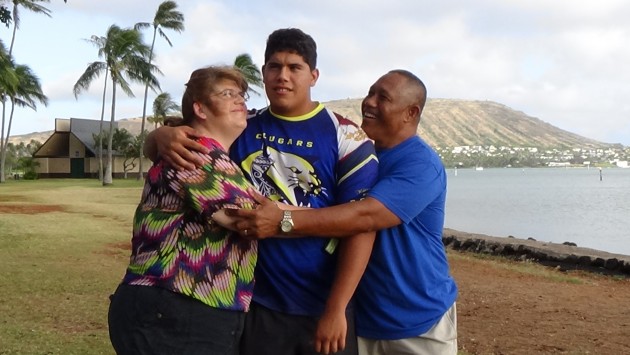 Michael Eletise with his mother (Marie) and father (Nofo). Paul Honda/Star-Advertiser