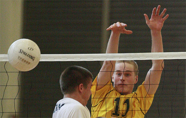 Hawaii Baptist's Chad Barretta blocked Parker Brown of Corona Del Mar in the first tournament in 2010. Cindy Ellen Russell / Star-Advertiser