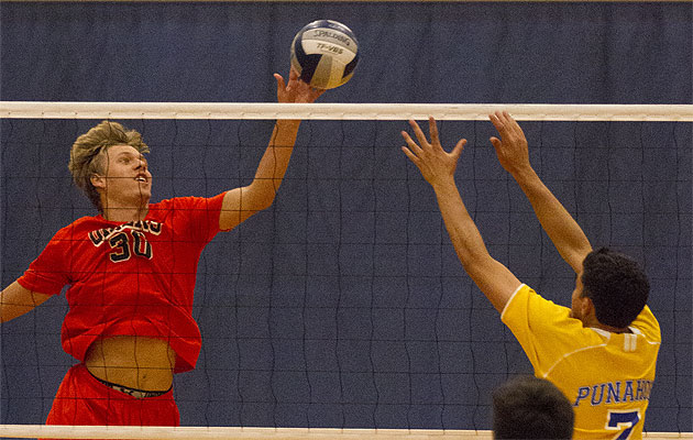 Huntington Beach's Ben Vaught tipped the ball as Punahou's Rohan Watamull tried to defend on Friday. Cindy Ellen Russell / Star-Advertiser