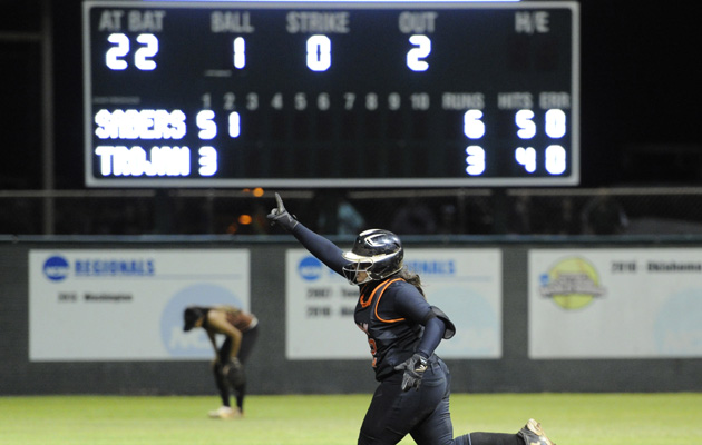 Campbell's Elisa Favela trotted around the bases during her three-run home run in the state title game.