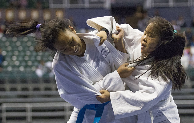 Kari Okubo, right, a two-time state judo champion, is Na Alii's most outstanding judoka of 2015.. Cindy Ellen Russell / Star-Advertiser