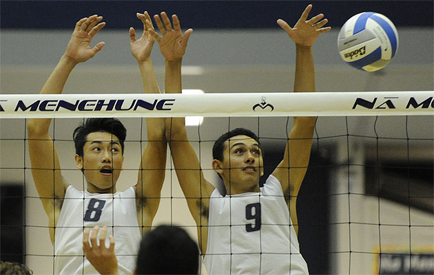Moanalua's Austin Matautia, right, is the OIA East boys volleyball player of the year. Karson Kruz, left, is an East first-team selection. Bruce Asato / Star-Advertiser