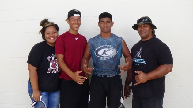 Angel, Ezra, Rocky with dad Toma Sava after the Fastletics-Brian Derby Camp 1-on-1 battles at Kaimuki High School field on May 31, 2015. Paul Honda/Star-Advertiser
