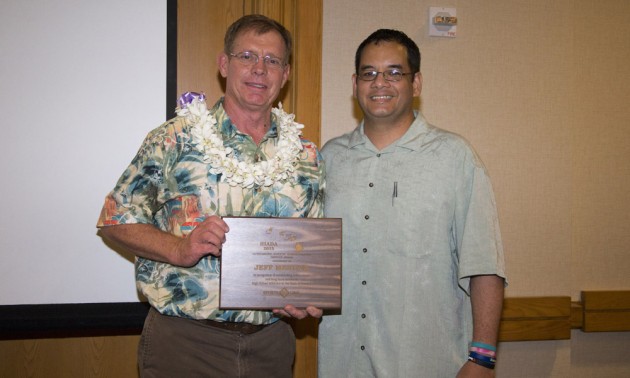Punahou associate athletic director Jeff Meister, left, was presented the HIADA Athletic Administrator of the Year Award by ILH interim executive director Georges Gilbert. Courtesy of HIADA.