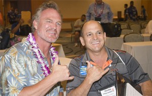 Brian Bosworth posted for a picture with Kalaheo athletic director Mark Brilhante on Tuesday at the Hilton Waikoloa Village. Jay Metzger / Special to the Honolulu Star-Advertiser.