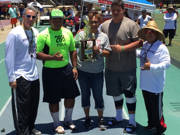 Julius-Pedro Muasau of Punahou (second from left) and Nate Herbig of Saint Louis (second from right) were named top offensive linemen at the GPA Maximum Exposure Camp on Sunday. Paul Honda/Star-Advertiser