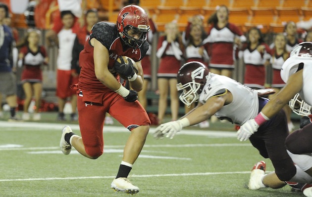 Kesi Ah-Hoy returns to lead the Kahuku offense in 2015. Photo by Bruce Asato/Star-Advertiser.