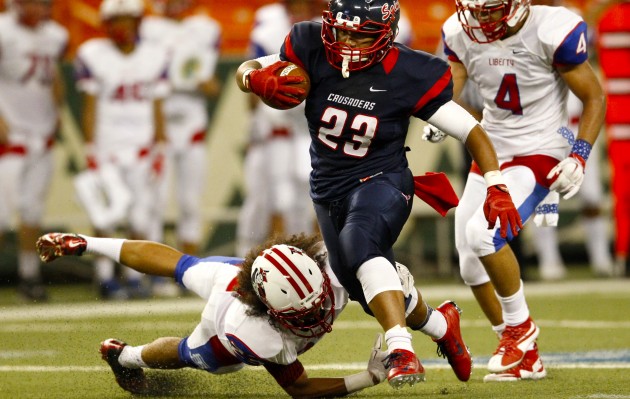 Saint Louis' Jahred Silofau found some running room in the Crusaders' 43-16 win over LIberty (Henderson, Nev.) on Saturday night at Aloha Stadium. Saint Louis, the No. 2 team in the Honolulu Star-Advertiser's Top 10, was one of seven ranked teams to win over the weekend.