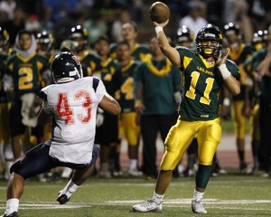 Leilehua's Kona Andres is trying to keep the Mules in the game against Waianae with his arm. Photo by Jamm Aquino/Star-Advertiser.