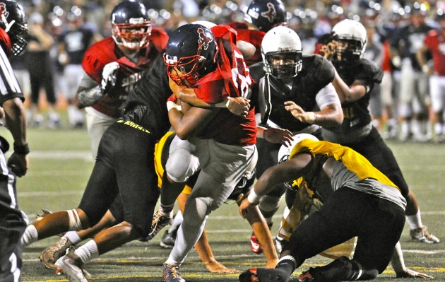Saint Louis running back Jahred Silofau and the second-ranked Crusader were idle last weekend. Liberty of Henderson, Nev., a team the Crusaders beat two weekends ago, handed No. 1 Mililani a 76-53 loss on Friday. In the national rankings, however, the Trojans are ahead of the Crusaders by 11 spots. The Honolulu Star-Advertiser's new Hawaii rankings will be published tomorrow. Bruce Asato / Honolulu Star-Advertiser.
