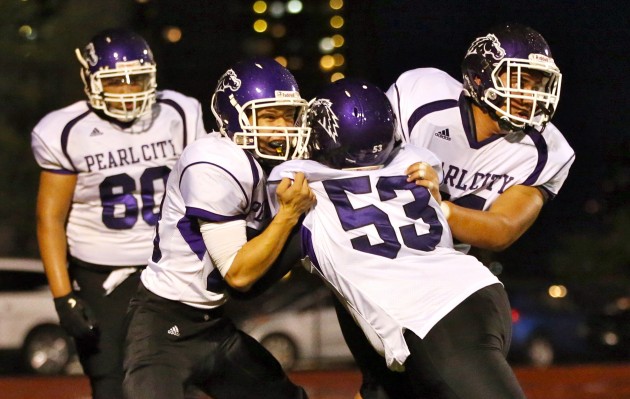 Pearl City is always in the mix in the OIA Division II football race. In photo, Chargers linemen prepared for a game against Roosevelt last season. Darryl Oumi / Special to the Honolulu Star-Advertiser.