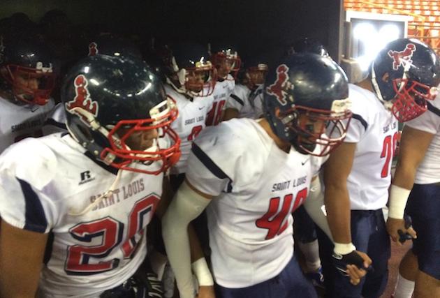 Saint Louis exits the tunnel to face No. 2 Punahou on Friday night. Photo by Jamm Aquino/Star-Advertiser.