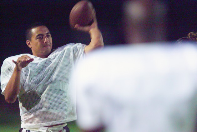 Lefty quarterback Fred Salanoa practiced for Team USA in preparation for an all-star game in Japan in 2005. When the photo was taken, he was three seasons into his 13-year run as Radford's head coach. George F. Lee / Honolulu Star-Advertiser.