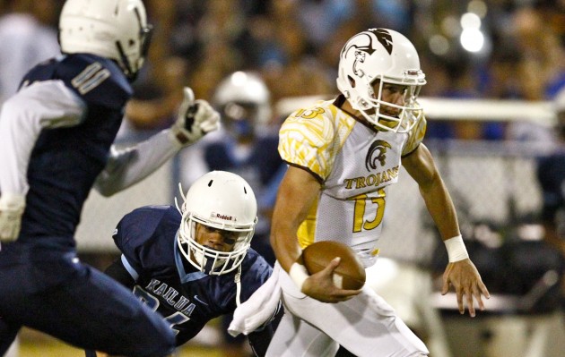 McKenzie Milton did not get much playing time against Kailua, leaving with an injury on the first series. Jamm Aquino / Star-Advertiser