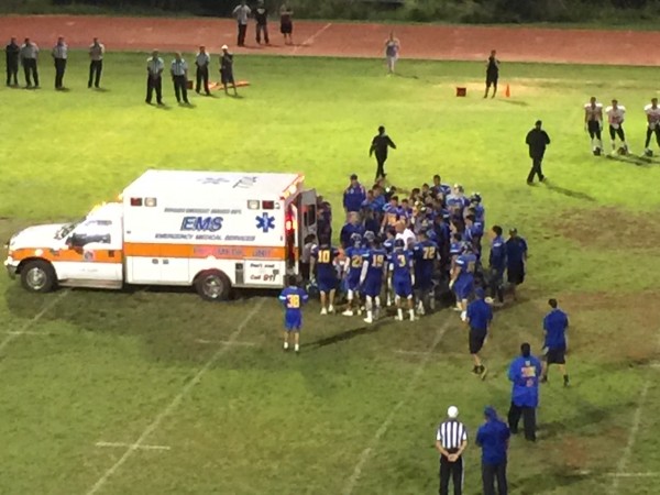 An ambulance is ready to take Kaiser senior QB/CB/KR Nic Tom to the hospital. Tom suffered a dislocated hip against Campbell during the first half. 