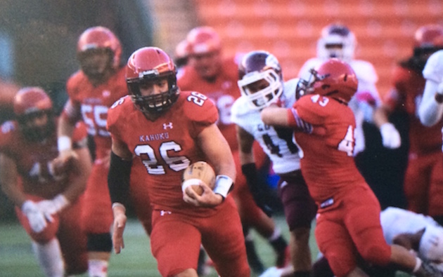 Kahuku's Kesi Ah-Hoy carried the ball on the first 21 plays from scrimmage and has 174 rushing yards at halftime. Photo by Jamm Aquino/Star-Advertiser.