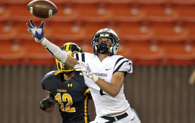 Kumoku Noa had seven receptions for 141 yards, but Kamehameha's 26-23 loss to No.  1 Punahou eliminated the Warriors from postseason possibilities. Jamm Aquino/Star-Advertiser