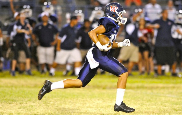 Waianae's Jorell Borge-Pontes sped for a 90-yard touchdown run during the Seariders' 37-22 OIA quarterfinal win over Kailua on Friday night at Raymond Torii Field. Bruce Asato / Honolulu Star-Advertiser.