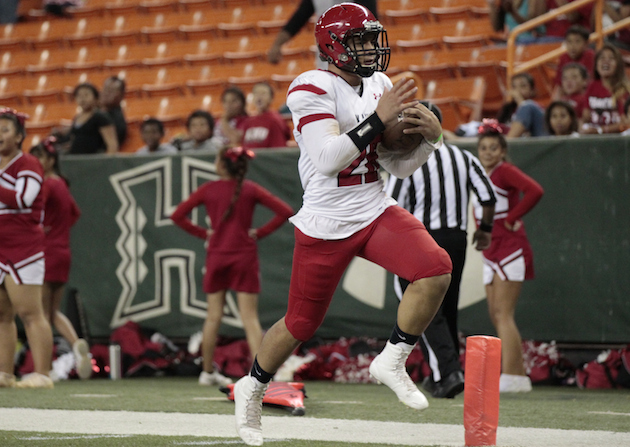 Kesi Ah-Hoy rushed for three touchdowns in Kahuku's statement win over Waianae on Saturday. Photo by Jamm Aquino/Star-Advertiser.