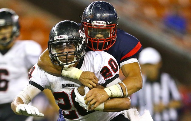 Saint Louis linebacker Isaac Slade-Matautia, back, did not see action against Mililani. He should be ready against Hilo on Aug. 20. Jay Metzer / Special to the Honolulu Star-Advertiser.