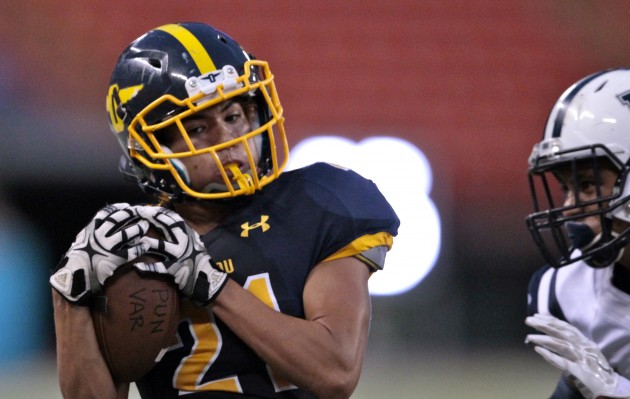 Punahou WR Ethan Takeyama had the game of his career against Kamehameha. The 5-foot-8, 155-pound junior had 14 receptions for 215 yards with two TDs. Jamm Aquino/Star-Advertiser 