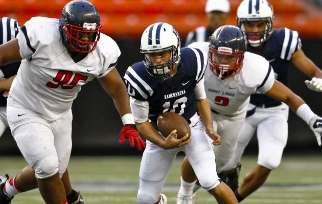 Kamehameha has not missed a beat with its passing game with Justice Young at the helm. Jamm Aquino / Star-Advertiser