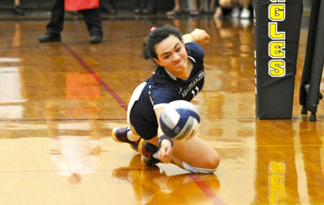 Kamehameha's Ililani Kamaka gets low to come up with this dig in the Warriors' comeback victory over Punahou on Friday night. Kamehameha meets ‘Iolani today for the overall Interscholastic League of Honolulu championship. Bruce Asato / Honolulu Star-Advertiser.