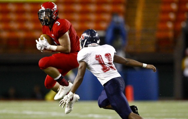 Kahuku's Keala Santiago had two interceptions on Friday against Waianae, including this one on a pass intended for Isaiah Freeney. Jamm Aquino / Honolulu Star-Advertiser.
