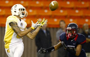 Kalakaua Timoteo caught the first touchdown of the game for Mililani. Photo by Jamm Aquino/Star-Advertiser.