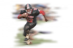Joe Igber rushed for 2,112 yards and 27 touchdowns in 10 ILH games as a senior. This was taken on the final TD run of his career. Photo by Dennis Oda; Image effects by Dean Sensui/Star-Bulletin.