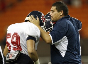 Waianae coach Walter Young consoled his players after a second loss to Kahuku. Jamm Aquino / Star-Advertiser