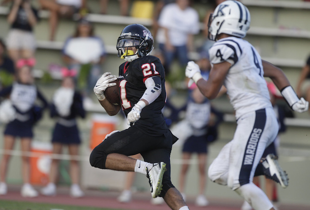 'Iolani's Keoni-Kordell Makekau ran away from the Kamehameha defense scoring his 22nd and final career receiving touchdown on a 51-yard pass in October. Photo by Krystle Marcellus/Star-Advertiser.