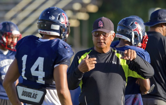 Saint Louis head coach Cal Lee is doing well after surgery, according to his brother, Crusaders assistant Ron Lee. Dennis Oda / Honolulu Star-Advertiser.