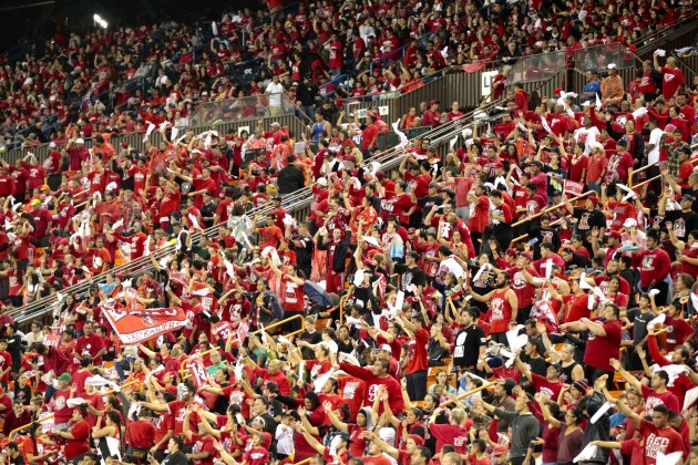 The whole town of Kahuku, it seems, comes out to watch the Red Raiders when they play in a state championship game at Aloha Stadium. Would the throngs come every single week if Kahuku was in a 10-team "power" conference? Jamm Aquino / Honolulu Star-Advertiser.