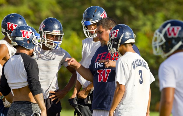 Walter Young talked to his players during practice on Thursday. Dennis Oda / Star-Advertiser