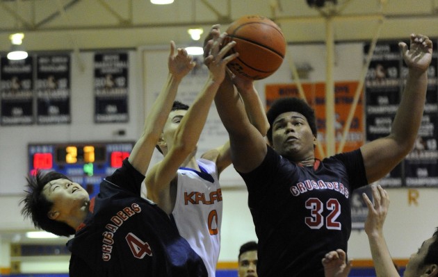 Saint Louis’ Zach Choo and Saint Louis’ Tristan Nichols go up for a rebound with Kalaheo’s Andrew Kearney  in the fourth quarter of the 2015 Pete Smith  Basketball Classic  tournament on the Peter Smith Court of Kalaheo High School gym,  Saturday,  December 19, 2015. Bruce Asato/Star-Advertiser