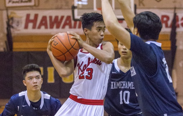 Mark Viloria and Kahuku were up and down this week after a long football season. Cindy Ellen Russell / Star-Advertiser