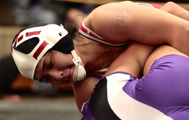 Radford's Angela Peralta, shown in a match earlier this season, won the 147-pound division at the Oahu Interscholastic Association wrestling championships Saturday. Jamm Aquino / Honolulu Star-Advertiser. 