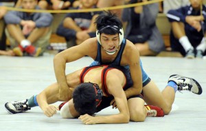 Kapolei's Shandon Ilaban-Totten topped ‘Iolani's Jake Angelo in the 132-pound quarterfinals. Ilaban-Totten is ranked No. 3 in the Honolulu Star-Advertier's pound-for-pound rankings. Bruce Asato / Honolulu Star-Advertiser.
