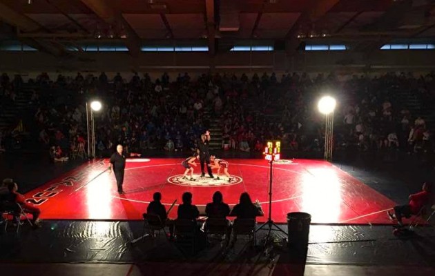 The bright lights inspired the girls in the Garner Ivey finals, with nine of the matches ending in a pin. 