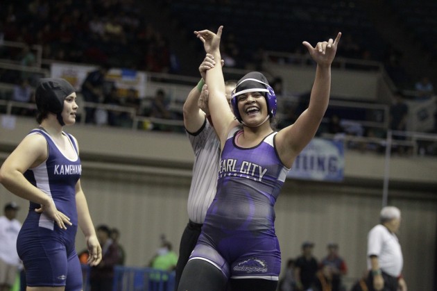 Pearl City's Jenny Fuamatu celebrated her stunning come-from-behind win over Kamehameha's Callan Medeiros in the semifinals at 168 pounds. Photo by Krystle Marcellus/Star-Advertiser.
