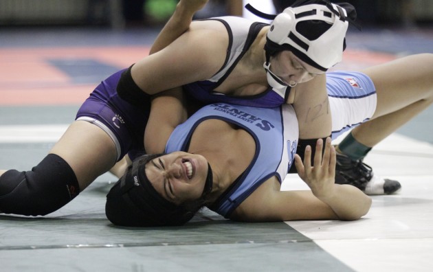 Pearl City's Asia Evans pinned St. Francis' Laynee Pasion in the semifinals. Photo by Krystle Marcellus/Star-Advertiser.