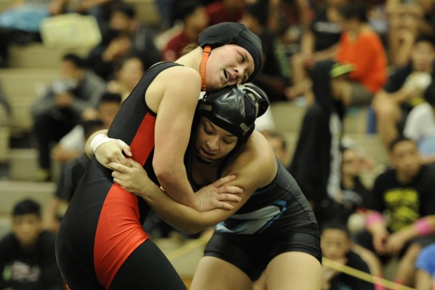 Kapolei's Taysia Kano wrestled Kahuku's Lilia Kaka at 140 pounds at the OIA Championships. Photo by Bruce Asato/Star-Advertiser.