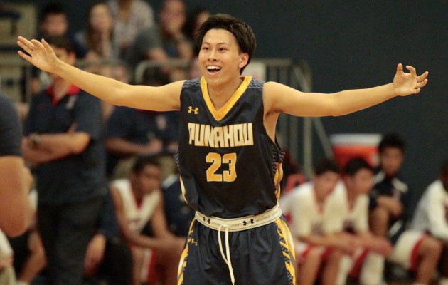 Punahou guard Jared Lum (23) gestures after a 3-point basket during the second half of an ILH boys basketball game between the Punahou Buffanblu and the Saint Louis Crusaders on Thursday, February 4, 2016 at McCabe Gymnasium. Jamm Aquino / Star-Advertiser
